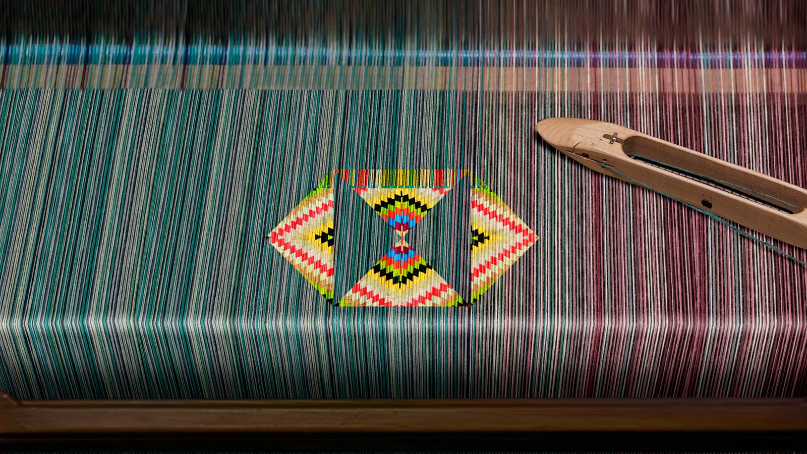 A boy doing schoolwork on his laptop