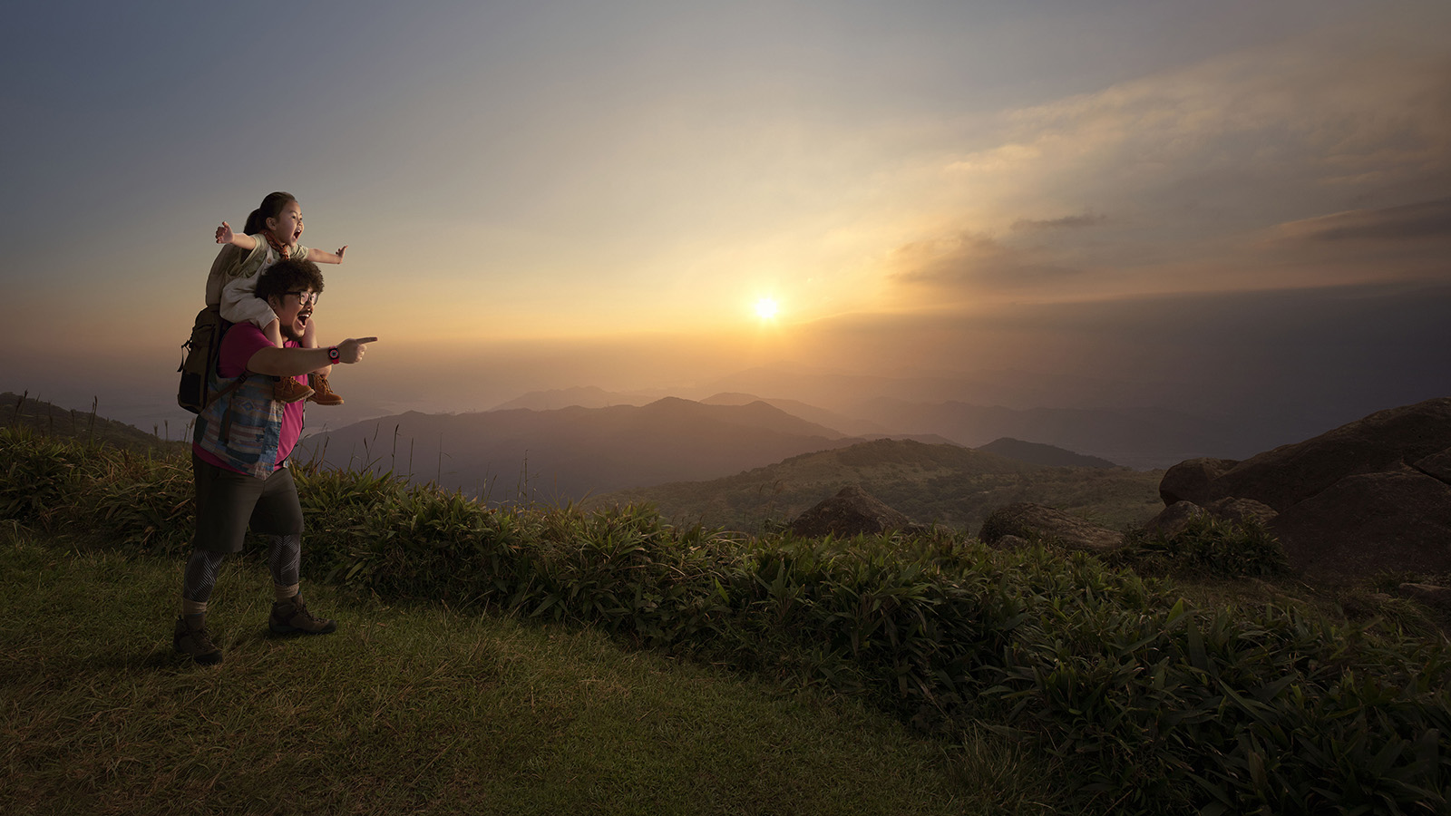 A father and daughter on a scenic hike together