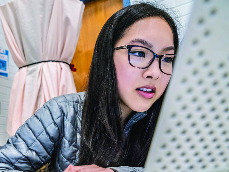 A girl working on her laptop