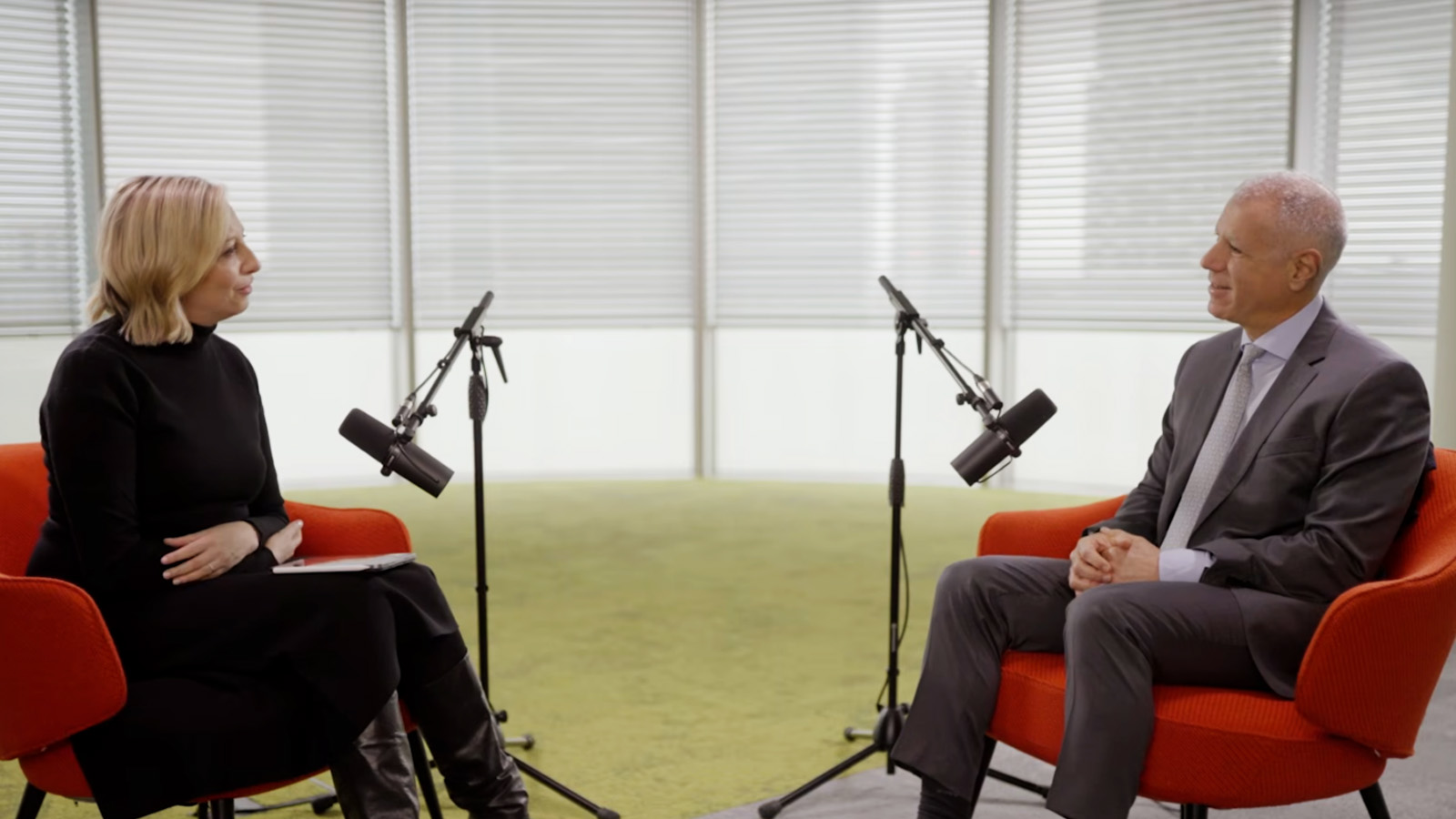 A photograph of Francine Lacqua and George Elhedery sitting opposite each other while recording the podcast.